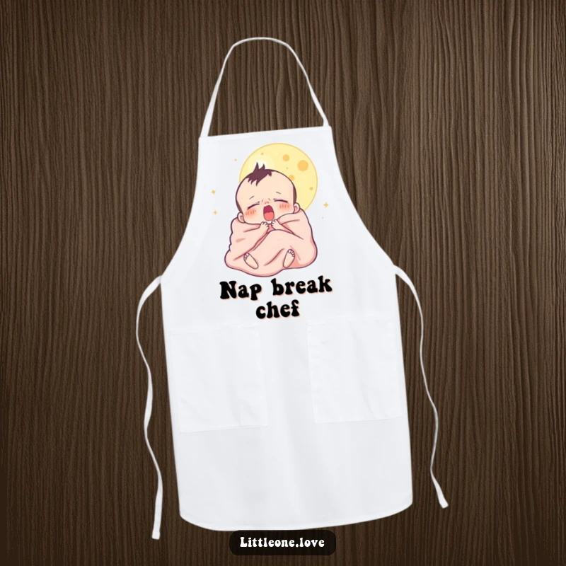 Funny apron showcasing a sleepy baby character yawning under the moon, wrapped in a blanket, perfect for a humorous kitchen accessory.