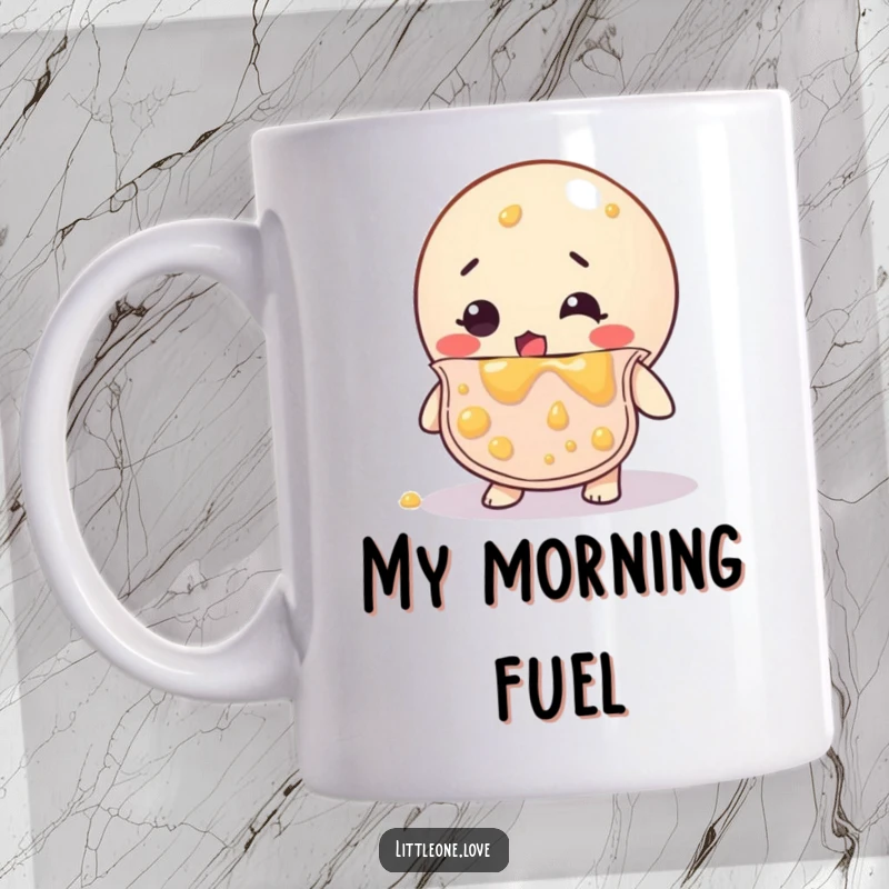 Funny mug featuring a lost-looking rubber ball in a bib, completely covered in flung baby food, a chaotic mealtime scene.