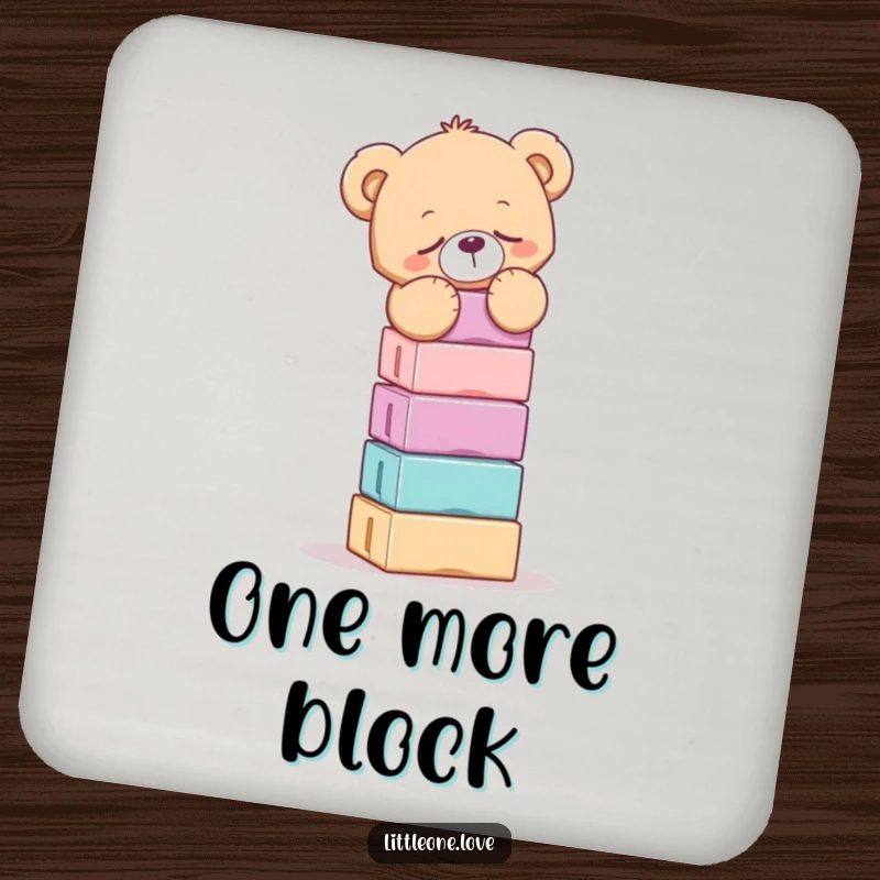 Funny drink coaster with a sleepy teddy bear precariously balancing a tall stack of blocks, a humorous and protective accessory.