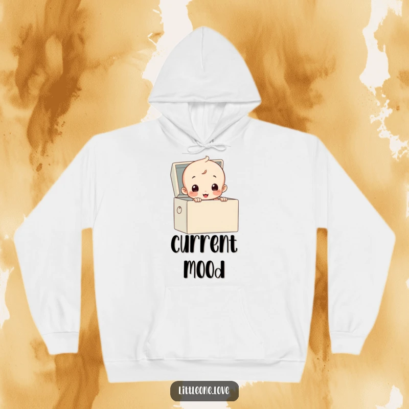 Funny hoodie showcasing a curious baby in a diaper peeking from a toy box, cozy and humorous.