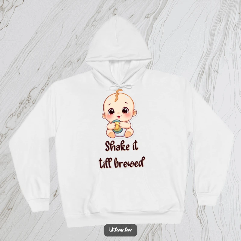 Funny chubby baby with wide, curious eyes clutching a rattle, featured on a cozy, warm hoodie for parents.
