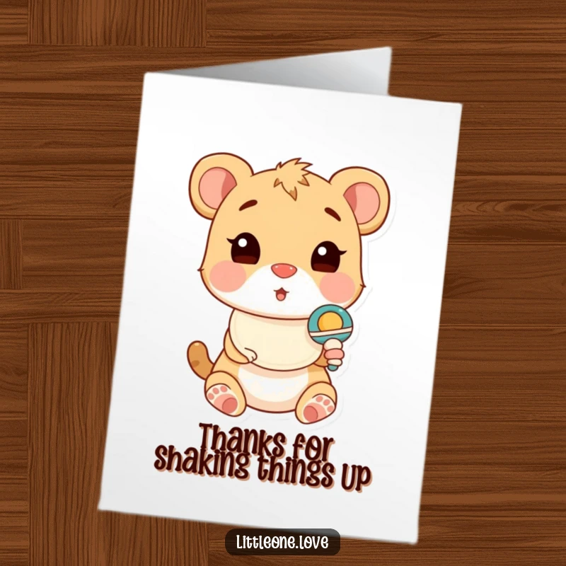Funny Free Printable Thank You Card: A baby animal wearing a bib stares in wide-eyed surprise at a playful rattle nearby.