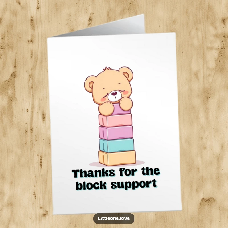 Funny Free Printable Thank You Card: Sleepy teddy bear balancing a tall block tower, conveying thanks with a tired smile.
