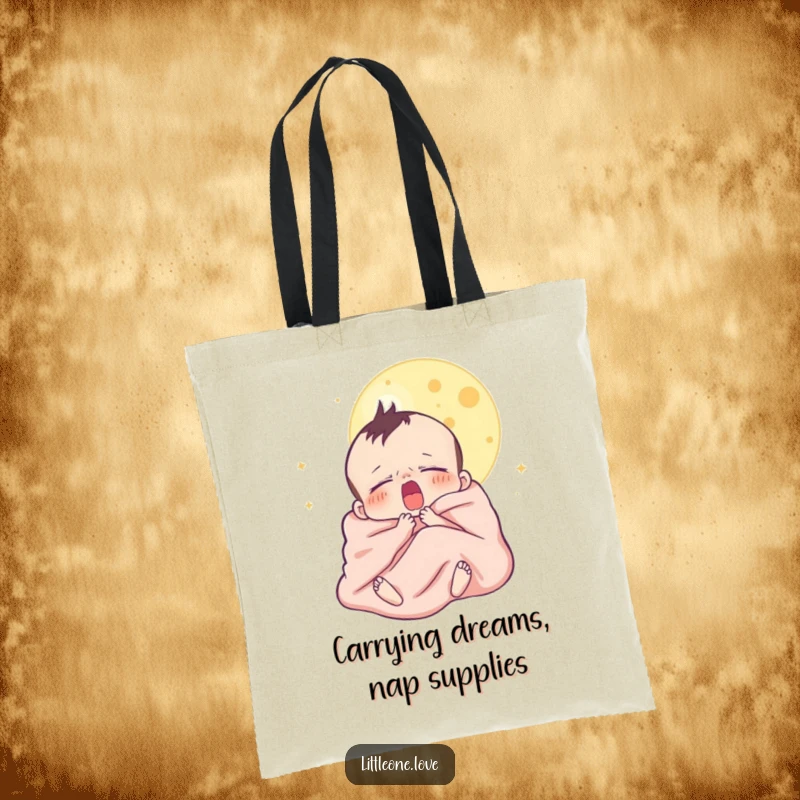 Funny tote bag depicting a sleepy baby character yawning under the moon, wrapped in a blanket, showcasing gentle humor and utility.