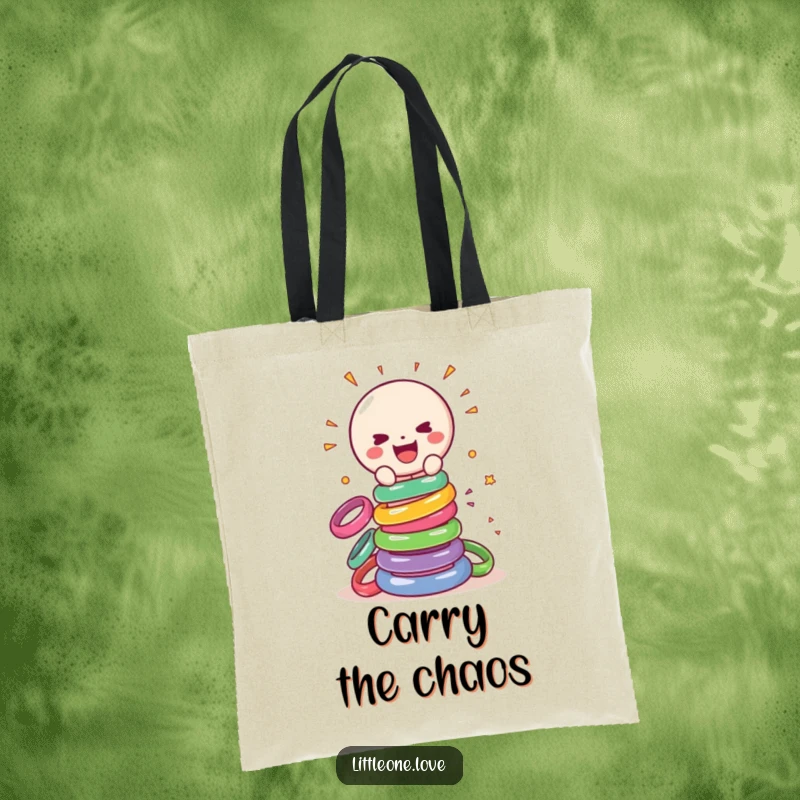 Funny tote bag featuring a cheerful, sentient baby rattle gleefully smashing a tower of colorful rings, a vibrant and humorous accessory.